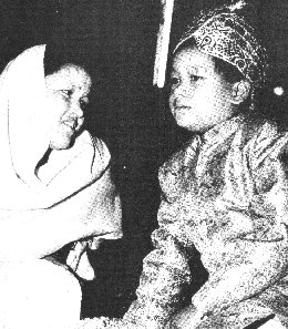 The Young Satguru Maharaji (Prem Rawat) Dressed as Krishna With Mata Ji