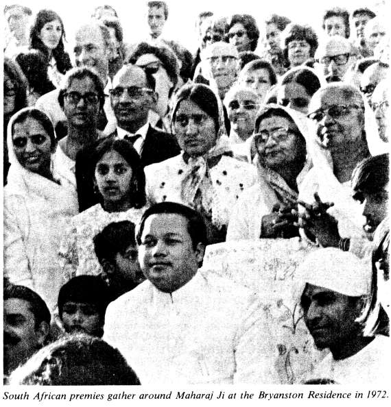 South African premies gather around Maharaj Ji at the Bryanston Residence in 1972