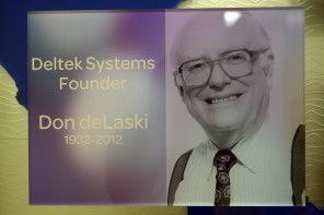 A portrait of Deltek's founder Don deLaski hangs in a hallway at the company's Herndon headquarters. DeLaski's company was the first to create accounting software designed solely for government contractors, and it expanded its services as contracting boomed over the decades.