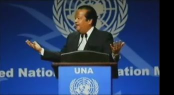 Prem Rawat pretending to speak to the United Nations