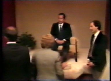 A line of people kissing Prem Rawat's feet