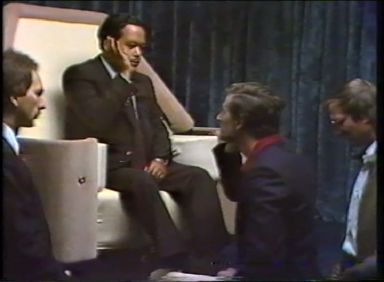 A line of people kissing Prem Rawat's feet