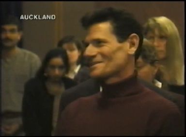 A line of people kissing Prem Rawat's feet