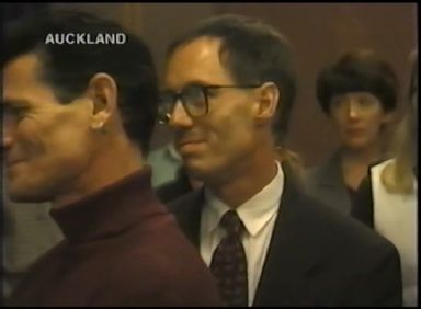 A line of people kissing Prem Rawat's feet