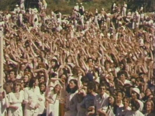 Click to See Larger Image of Prem Rawat (Maharaji) Showering His Devotees With Coloured Water From Giant Water Pistol Prem Rawat Inspirational Speaker Showering His Devotees With Coloured Water From Giant Water Pistol