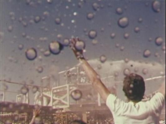 Click to See Larger Image of Prem Rawat (Maharaji) Showering His Devotees With Coloured Water From Giant Water Pistol Prem Rawat Inspirational Speaker Showering His Devotees With Coloured Water From Giant Water Pistol