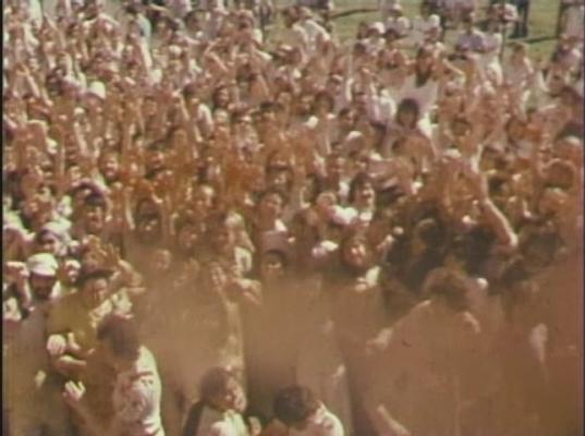 Click to See Larger Image of Prem Rawat (Maharaji) Showering His Devotees With Coloured Water From Giant Water Pistol Prem Rawat Inspirational Speaker Showering His Devotees With Coloured Water From Giant Water Pistol