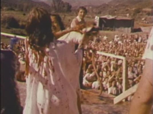 Click to See Larger Image of Rawat's Wife OutWrestling Him Rawat's Wife OutWrestling Him