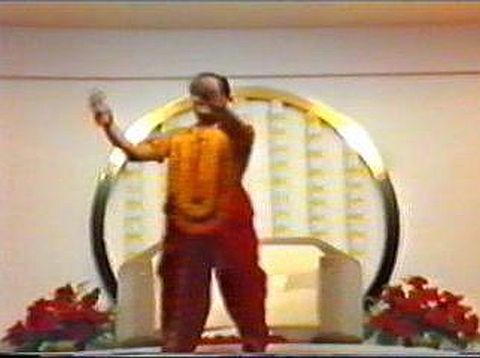 Prem Rawat dancing on stage